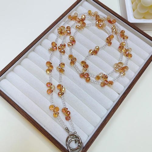 Gota de cristal que cruza la cadena del teléfono (amarillo)