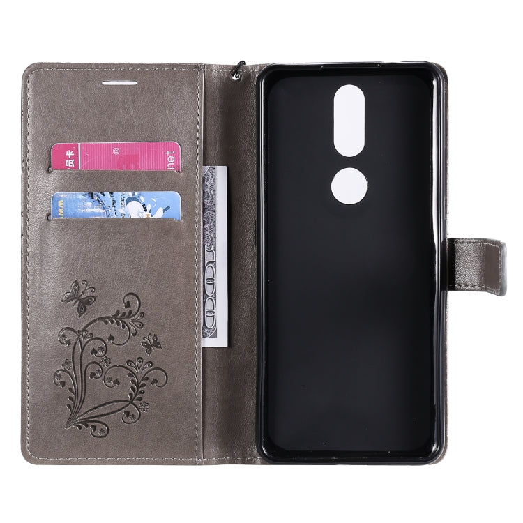 Para Nokia 2.4 3D Mariposas en relieve Patrón Horizontal Flip Funda de cuero con soporte, ranura para tarjeta y billetera (gris)