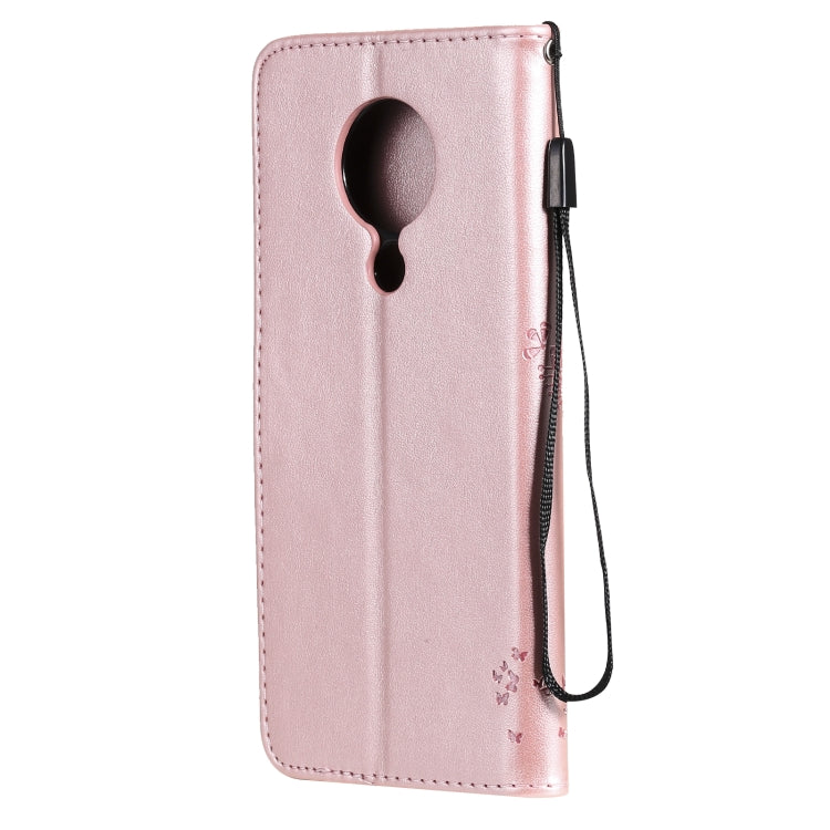 Para Nokia 5.3 Patrón de árbol y gato Impresión prensada Funda de cuero Horizontal Flip PU con soporte y ranuras para tarjetas y billetera y cordón (oro rosa)
