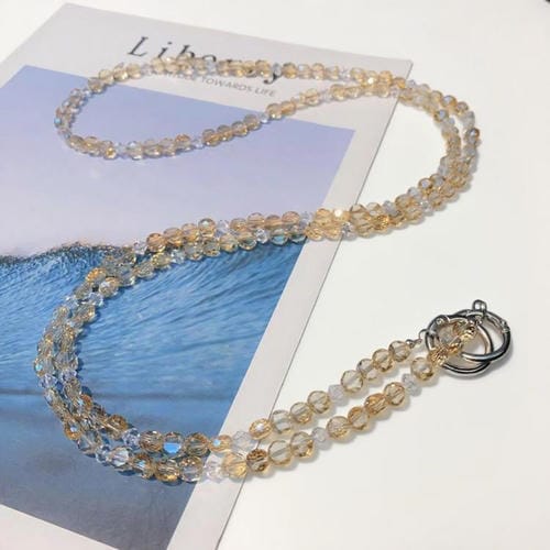 Cadena larga para teléfono móvil con perlas de cristal (oro champán cristalino)