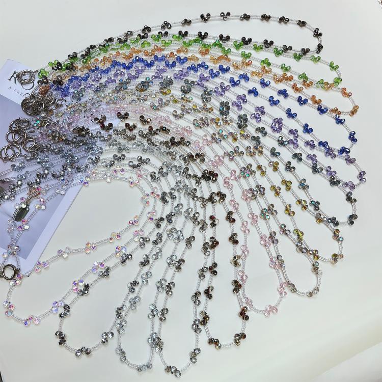 Cadena de teléfono con cristales en forma de gota (color caramelo)
